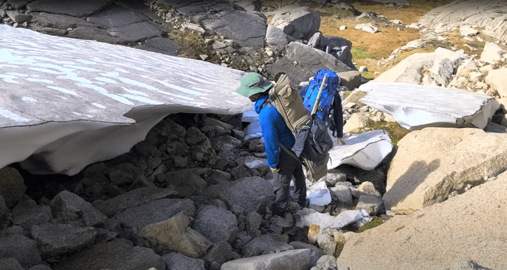 PHOTO 1 Walking past Twynam upper snowpatch 20230501